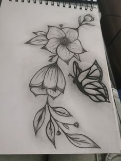 a pencil drawing of flowers and leaves on a sheet of paper with the words, i love