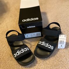 Brand New Never Been Worn Size 4 In Kids Unisex Sandals Black Adidas Slide Sandals, Adidas Black Sport Sandals For Summer, Adidas Black Synthetic Sport Sandals, Adidas Non-slip Round Toe Sandals, Black Adidas Sandals For Summer, Adidas Non-slip Slip-on Sandals, Adidas Sporty Sandals With Round Toe, Adidas Casual Synthetic Sandals, Adjustable Non-slip Black Sandals