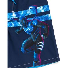 Your little hero is ready for a fun adventure in these cool DC Comics swim shorts! This stylish bathing suit features a comfy built-in mesh lining, secure elastic waist with an adjustable drawstring closure, and awesome artwork of their new favorite superhero Blue Beetle in his scarab armor looking ready for action! Made of a quick-drying material that is comfortable to wear in and out of the water, these sun-protecting Blue Beetle board shorts are the perfect summer essential for your DC fan! Stylish Bathing Suits, Awesome Artwork, Bathing Suit Shorts, Fun Adventure, Blue Beetle, Boys Swim, Summer Essential, Stylish Kids, Amazing Adventures