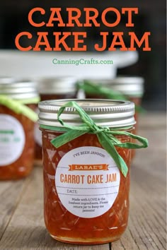 carrot cake jam in a jar on a wooden table with the words carrot cake jam