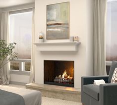 a living room with a fire place in the middle and a painting on the wall