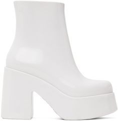 Ankle-high lightweight PVC boots in white. · Logo embossed at outer side · Zip closure at inner side · Logo printed at padded faux-leather footbed · Textured rubber interior · PVC platform midsole and block heel · Treaded PVC sole · Platform: H1.75 · Heel: H4 Supplier color: White Modern White Boots With Lug Sole, White High-top Boots With Padded Ankle, Modern White Boots With Rubber Sole, White Leather Platform Heeled Boots, White High-top Boots With Reinforced Heel, White High Ankle Synthetic Heeled Boots, Modern White High-top Boots, White Ankle-high Boots With Rubber Sole, White Heeled Boots With Padded High Ankle