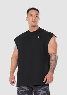 #color_Black Athleisure Cotton Tank T-shirt, Cotton Tank T-shirt For Athleisure, Relaxed Fit Tank Top With Dropped Armholes For Athleisure, Workout Tank Top With Dropped Armholes, Relaxed Fit Solid Tank Top For Workout, Cotton Sleeveless Muscle Tee For Athleisure, Cotton Sleeveless Athleisure Muscle Tee, Athleisure Crew Neck Gym Vest, Relaxed Fit Muscle Tee For Workout