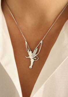 15 süße Disney Schmuck Artikel zu kaufen  15 Cute Disney Jewelry items to Buy   15 süße Disney Schmuck Artikel zu kaufen   #Artikel #Disney #Kaufen #Schmuck #Süße #zu Tinkerbell Necklace, Tinkerbell Jewelry, Elf Necklace, Cute Angel Wings, Bell Necklace, Fashion Angels, Cute Angel, Fairy Necklace, Necklace Flower