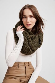 Meet London, our beloved oversized chunky infinity scarf—a staple accessory you need for any chilly day. So cozy and soft, made of French merino-based soft yarn that gives London a luxury feel similar to cashmere and silk. It can be worn as just an infinity scarf or as a head covering at the same time. | Available in one size. Laid flat, the scarf measures 29" (74 cm) x 19" (48 cm), which is half of the loop. French soft yarn (20% Merino Wool / 80% Acrylic).Dry clean or hand wash in cold water a Infinity Scarf Crochet, Chunky Infinity Scarves, Infinity Scarves, Loop Scarf, Winter Clothing, Wool Knit, The Loop, Head Covering, Wool Scarf