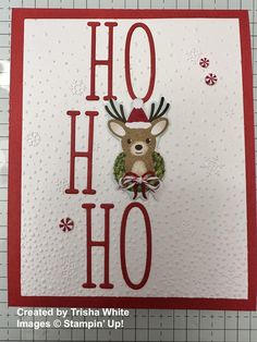 a close up of a card with the words ho hoo and a deer on it