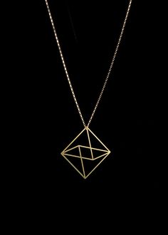 The Octahedron pendant is part of The Edges Collection. Inspired by a simple line drawing, the two-dimensional octahedron shape creates the illusion of geometry in three dimensions. The visual ambiguity results in wearable art that is light and minimal, understated yet unique. Available as either 14K gold-plated with a gold-filled chain or stainless steel with a sterling silver chain. All chains are 18". The Edges collection is created through a process of photochemical etching. Modern Diamond-shaped Necklace As Gift, Modern Diamond-shaped Necklace As A Gift, Modern Diamond-shaped Necklace For Gift, Minimalist Geometric 14k Gold Jewelry, Minimalist Geometric Jewelry In 14k Gold, Minimalist 14k Gold Geometric Jewelry, Geometric Minimalist Formal Jewelry, Geometric 14k Gold Jewelry, Minimalist Pyramid-shaped Jewelry For Gifts