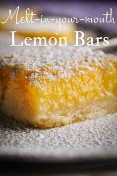 a close up of a piece of cake on a plate with the words melt in your mouth lemon bars