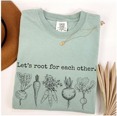 Comfort Colors® Let's Root For Each Other Shirt, Gardening Vegies Tshirt, Farmers Market Root Tee, Plant Lady Shirt, Homesteading Mom Tee ♥ Experience the ultimate comfort of Comfort Color garment-dyed shirts! These cotton-washed tees offer unrivaled comfort and a retro-vintage vibe. The colors are stunning and enduring, ensuring a timeless appeal that never disappoints. Plus, they stay pristine without piling, making them a true wardrobe staple. ♥ Our unisex sizing ensures a versatile fit that' Green Tops With Letter Print For Gardening, Homesteading Mom, Rooted Christian Shirt, Rooted In Christ Shirt, Plant Lady Shirt, Casual Spring T-shirt For Gardening, Green Relaxed Fit T-shirt For Gardening, The Roots T-shirt, Mom Tees