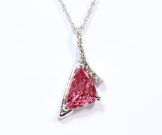 We create the most unique and truly one-of-a-kind custom jewelry. This modern pink tourmaline was hand cut by a National Award winning gemstone master. The angular shape of the pendant compliment the cuts of the gemstone. DETAILS - 1.42-carat Genuine Specialty-cut Pink Tourmaline - .15cttw round brilliant cut diamonds - 14-karat white gold setting - 14-karat white gold Sparkling Singapore chain White Gold Set, Custom Ideas, Gold Sparkle, Round Brilliant Cut Diamond, Pink Tourmaline, Round Brilliant Cut, Brilliant Cut Diamond, Round Brilliant, Custom Jewelry