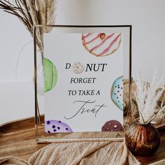 a sign that says don't nut forget to take a treat next to some dried plants