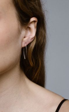 Part of our Classic collection, these pieces take their name from a family member. The threader earrings mix elegant and modern design. Each is handmade, tapered, shaped, and delicately hammered for a classic finish. Lightweight and comfortable to wear, they work well with any look. A balance of timelessness and modernity. The earrings measure 1.25" long and 0.50" wide, crafted with 14k gold fill or sterling silver. Benefitting from smooth tapering and careful shaping, one side boasts a delicate Silver Earrings Aesthetic, Long Silver Earrings, Earrings Aesthetic, Threader Earrings, Classic Collection, 14kt Gold, Gold Filled, Silver Earrings, Modern Design