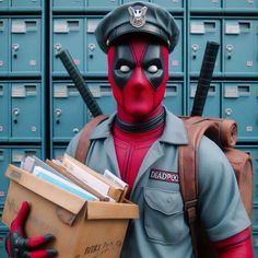 a man dressed as deadpool holding a box