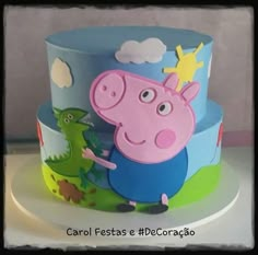 a peppa pig birthday cake on a plate