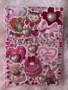 a pink card with lots of hearts and animals on it