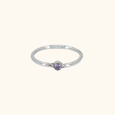 Our Diamond Ring Band is perfect if you love wearing simple and dainty jewelry!Finish: 18k gold Material: Stainless Steel*Tarnish Free* Promise Ring Dainty 14k Gold Amethyst Ring, Minimalist Stackable Crystal Promise Ring, Dainty Hypoallergenic Stackable Promise Rings, Minimalist Silver-colored Birthstone Ring In 14k Gold, Minimalist Silver-colored 14k Gold Birthstone Ring, Dainty Bezel Set Midi Rings With Round Band, Dainty Solitaire Stackable Promise Rings, Minimalist 14k Gold Silver Birthstone Ring, Dainty Round Band Midi Promise Rings