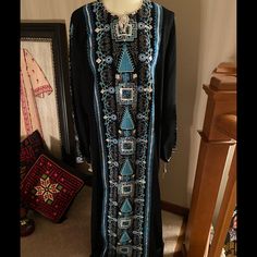 New Women Black And Blue Abaya In Size 3 . Never Worn But No Tags On. Originally Bought From Dubai. Embellished With Beautiful Sequins . Length 58” Long And 13” From Armpit To Arm Pit . Bohemian Black Evening Abaya, Traditional Blue Embellished Abaya, Traditional Embellished Blue Abaya, Bohemian Black Abaya With Dabka Detailing, Black Bohemian Embellished Kaftan, Blue Embellished Thobe For Eid, Blue Embellished Long Abaya, Embellished Long Blue Abaya, Embellished Black Bohemian Kaftan