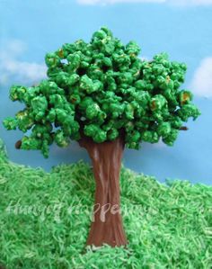 a fake tree made out of green grass