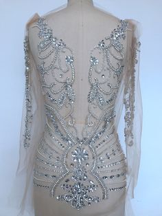 Silver Gown With Rhinestones For Party, Silver Sparkling Dress For Banquet, Silver Embellished Gown For Prom Season, Elegant Silver Gown With Rhinestones, Silver Rhinestone Gown For Prom, Silver Sequined Gown For Banquet, Silver Rhinestone Gown For Prom Season, Silver Gown With Rhinestones For Gala, Glamorous Silver Rhinestone Evening Dress