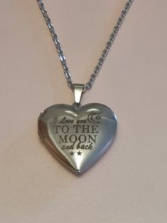 'I Love you to the Moon and Back' Necklace Pendant. Beautiful Necklace. Locket. Gift for Special occasions Valentine's Day Wedding Jewelry With Adjustable Chain, Valentine’s Day Wedding Jewelry With Adjustable Chain, Engraved Necklaces For Wedding On Valentine's Day, Locket Necklace For Valentine's Day Wedding, Valentine's Day Wedding Jewelry: Round Pendant, Wedding Jewelry For Valentine's Day: Round Pendant, Stainless Steel Heart Pendant Jewelry For Wedding, Heart Locket Necklace For Wedding And Mother's Day, Engraved Jewelry For Wedding Gift And Valentine's Day