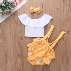 *Product Title:Baby Girl Ruffle Top & Suspender Shorts & Polka Dot Headband*Keyword Tag:dhgate baby girl clothes*For Season:Summer*Thickness:Regular*Package Include:3 Pieces*Fabric:Cotton,Polyester,Non-woven fabrics*Care Label:On the inside Cotton Polka Dot Sets For Summer, Cute Polka Dot Sets For Spring, Cute Summer Sets With Matching Headband, Cute Polka Dot Spring Sets, Cute Polka Dot Summer Sets, Summer Playtime Set With Matching Headband, Summer Playtime Sets With Matching Headband, Polka Dot Fitted Summer Sets, Playful Polka Dot Sets For Spring