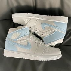 Custom Nike Air Jordan 1 Mid Baby Blue White Half-oicustom Nike Shoes Women Fashion, Kd Sneakers, Custom Nike Air, Boty Nike, Blue Slippers, Trendy Shoes Sneakers, Nike Fashion Shoes, Nike Air Jordan 1 Mid, All Nike Shoes