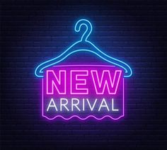 a neon sign with the words new arrival hanging on a hanger in front of a brick wall