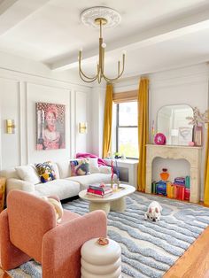 a living room filled with furniture and a dog laying on the floor next to it