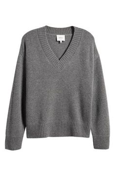 A blend of recycled cashmere and wool adds a luxuriously soft feel to this oversized, layerable V-neck sweater trimmed with cozy ribbing. 24 1/4" length (size XS) V-neck Long sleeves Ribbed cuffs and hem 70% recycled cashmere, 25% cashmere, 5% wool Dry clean Imported Cashmere Sweater V Neck, Grey Vneck Sweater, Recycled Cashmere, Fall 24, Fabric Gift Bags, Oversized Silhouette, Cashmere Wool, Fabric Gifts, Wool Blend Sweater