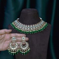 Necklace includes - 1 Necklace + 1 Pair of Earrings + 1 Tikka Polish - Gold Polish Metal - Alloy  Note-  Due to the lighting, there may be a slight variation in the color of the jewelry in the photo. Green Jewelry For Marriage And Festivals, Green Necklace For Marriage And Festive Occasions, Punjabi Wedding Jewelry, Punjabi Wedding, Jewellery Set, Gold Polish, Wedding Jewelry Sets, Polish Jewelry, Necklace Earrings