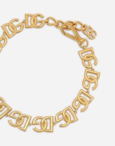 Choker with DG multi-logos: Gold Clasp fastening Nickel-free and hypoallergenic materials Engraved logo Made in Italy Stefano Gabbana, Engraved Logo, Italian Luxury, Dolce & Gabbana, Italian Design, Gold Metal, Choker, Dolce And Gabbana, In Italy