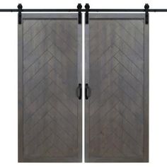 an image of a pair of sliding doors with black hardware on each side and one door open