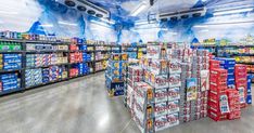 an empty grocery store filled with lots of boxes