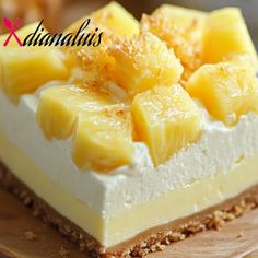 there is a piece of cheesecake with pineapples on top