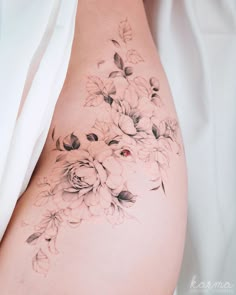 a woman's stomach with flowers on it