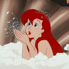 ariel from the little mermaid with bubbles coming out of her mouth