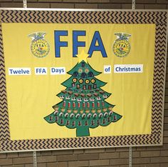 a wall hanging with a christmas tree and the words ffa written in different languages