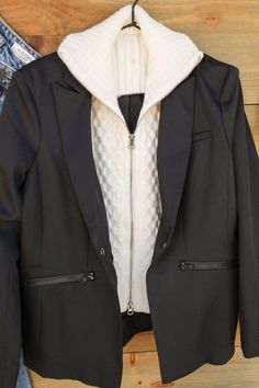 Geyser White Sweater Black Blazer Combo The Geyser Blazer in a chic tone of black is stunning with its attached white sweater! Blazer features long sleeves, lapel collar, open front, front zip pockets, and lined. Attached sweater features turtle neck and zippered front closure. This beauty will certainly add some versatility to your wardrobe as it is great for work and nicely transitions to an evening out! Pair with jeans for a classy look! Product Details Blazer: Long Sleeves Lapel Collar Open Polyester Sweater, Night Tops, Sweater Blazer, Top Graphic Tees, White Sweater, Black Blazer, Sweater Black, How To Look Classy, Graphic Tee Shirts