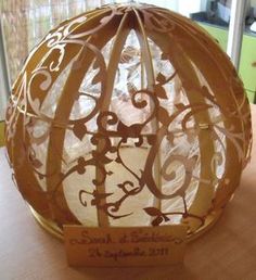 a decorative paper ball on top of a table