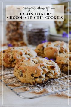 chocolate chip cookies cooling on a rack with text overlay that reads living the gourmet