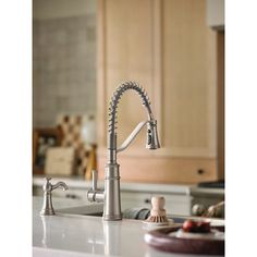 a kitchen sink and faucet in a home