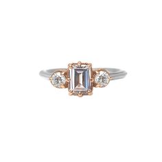 A champagne diamond is a perfect symbol to celebrate your life's moment. This piece is one of a kind. About this ring: Made in 14k rose gold and white gold Center Diamond: 1.01ct champagne emerald cut diamond (olive-brown, champagne tone) Accent Diamond: ~0.3ctw champagne round diamonds Clarity: SI1 Measurements: Top Width: 7mm, Width: 1.8mm Finger size 6, resizable 5-7 This piece is in stock and will take 2-3 days to ship. (Resizing may take extra 2-3days.) Thinking of using different metals or Champagne Diamond Ring, Striking Beauty, Champagne Diamond Rings, White Diamond Ring, Emerald Cut Diamond, Champagne Diamond, Emerald Cut Diamonds, One Ring, Three Stone