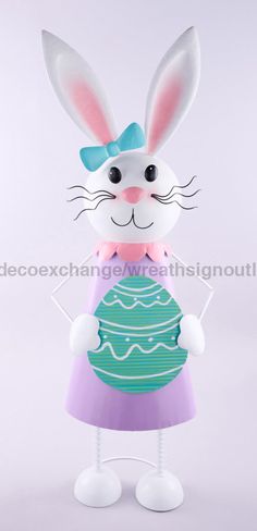 an easter bunny is standing in front of a white background