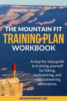 the mountain fit training plan workbook with a person standing on top of a cliff