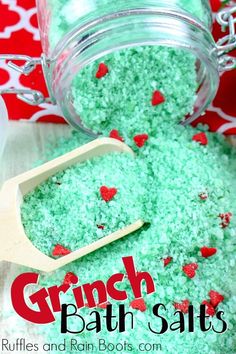 green bath salts in a glass jar with a wooden spoon and red hearts on it