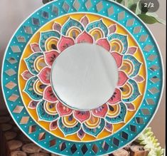 a colorful plate sitting on top of a table