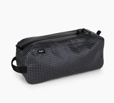 a black and white checkered toilet bag