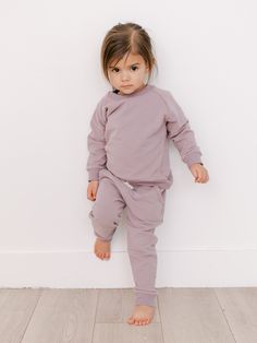 *This is a preorder item. Orders are expected to arrive in approximately 4-5 weeks. This Organic Cotton Sweatsuit Set is so buttery soft you’ll try to squeeze in it yourself! Featuring functioning pockets and drawstrings, these Organic Cotton Sweatsuit Sets are more than just a cute fashion statement. Don't miss out on the coziest Sweatsuits you'll find on the internet! DETAILS: 95% organic cotton 5% spandex True to size Models are wearing size 2T Size Chart 3-6M 6-12M 12-18M 18-24M 2T 3T 4T Bod Solid Color Long Sleeve Onesie For Playwear, Solid Long Sleeve Onesie For Playwear, Solid Color Long Sleeve Onesie For Playtime, Sweatsuit Set, Grab Bags, Daughter Love, Cute Fashion, Fashion Statement, Baby Clothes