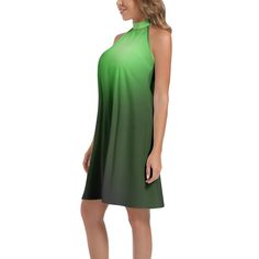 "Introducing the Neduz Incept Collection: Make a sophisticated and elegant statement with this Green Halter Neck Midi Dress, tailored for fashion-forward individuals. Crafted from luxurious chiffon with a subtle stretch, this sleeveless dress is perfect for any occasion. Its halter neck, tie-back closure, and A-line flare silhouette provide a flattering fit for every figure. The golden ornamental details add a touch of glamour, making it ideal for parties, vacations, office wear, or casual outings. Our model, at a statuesque 5'8.9\", wears a size Small, showcasing the dress's regular fit designed to accentuate your natural curves (B:35.43\", W:24.41\", H:36.22\"). For your convenience, this dress is machine washable, though we recommend avoiding bleach to maintain its pristine condition. W Luxury Green Halter Dress For Women, Luxury Green Halter Neck Dress, Luxury Green Sleeveless Halter Dress, Luxury Green Sleeveless Midi Dress, Luxury Green Dress For Office Wear, Luxury Fitted Green Halter Dress, Halter Neck Midi Dress, Natural Curves, Office Wear