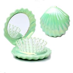 PRICES MAY VARY. ✔ PERFECT DESIGN:This foldable hairbrush with mirror is designed as a beautiful shell shaped appearance,and its surface has been treated with illusion electroplating craft, makes it has a shiny finish with anti-scratch effect.The moment you got it, you will be amazed by its excellent design. ✔ Features:The purse brush body can be folded,one side is a brush,another side is a makeup mirror.It is convenient to carry and store, making your travel more convenient, and the storage spa Travel Hair, Travel Hairstyles, Hair Massage, Mermaid Aesthetic, Hair Brushes, Normal Hair, Mirror Designs, Round Mirrors, Styling Tools